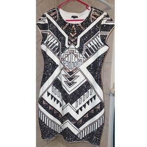 Express sequin form fitting dress, white dress with black and dark gold sequins